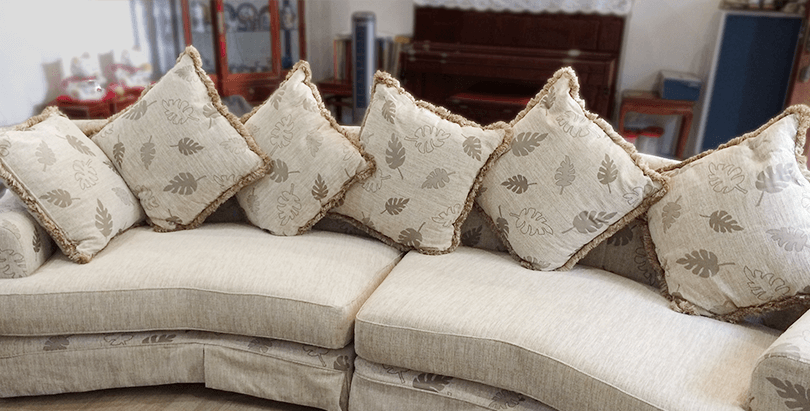 brown-floral-cushion-sofa